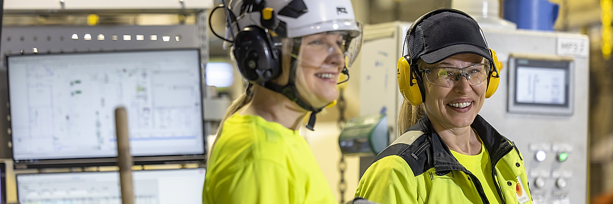Employees at consumer board production plant.