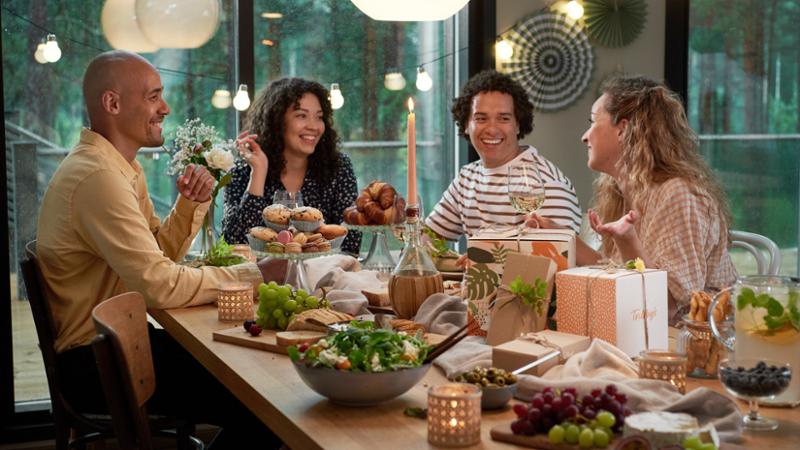 Four people having dinner