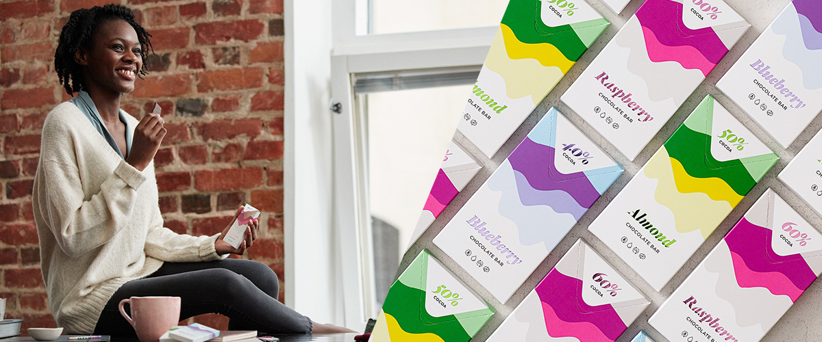 Woman having a piece of chocolate, chocolate packaging