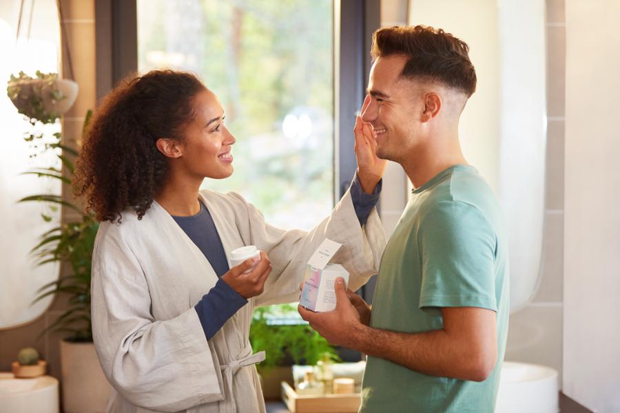People applying personal care products