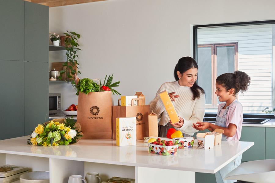 Mother and son in kitchen