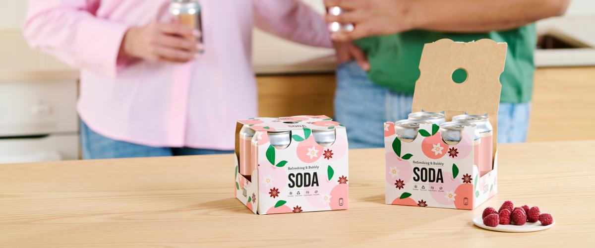 Two beverage multipacks on a wooden table